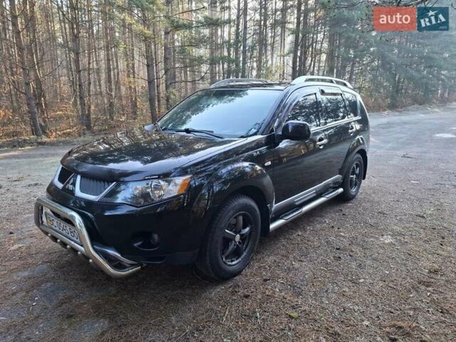 Черный Мицубиси Аутлендер ХЛ, объемом двигателя 2.4 л и пробегом 127 тыс. км за 10500 $, фото 17 на Automoto.ua