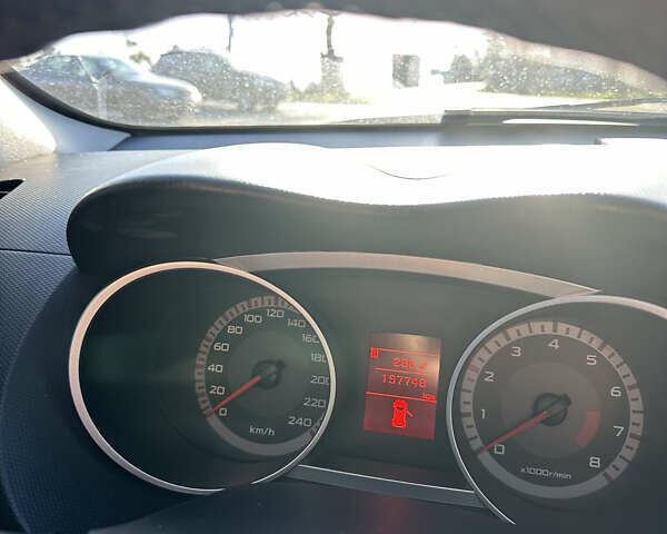 Черный Мицубиси Аутлендер ХЛ, объемом двигателя 2.4 л и пробегом 198 тыс. км за 11000 $, фото 1 на Automoto.ua