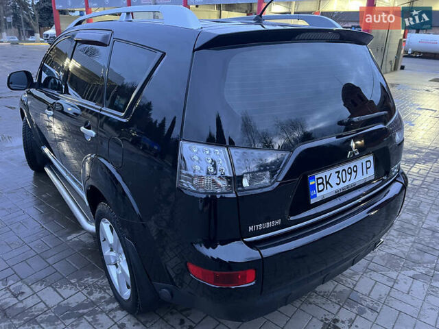 Чорний Міцубісі Аутлендер ХЛ, об'ємом двигуна 2.36 л та пробігом 230 тис. км за 9400 $, фото 2 на Automoto.ua