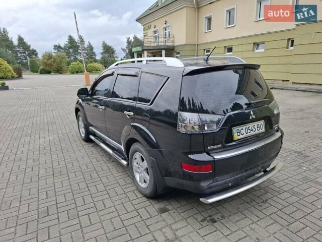 Черный Мицубиси Аутлендер ХЛ, объемом двигателя 2.4 л и пробегом 127 тыс. км за 10500 $, фото 9 на Automoto.ua