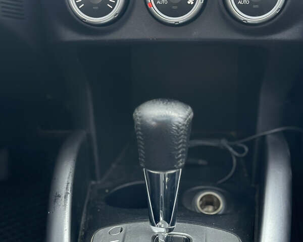 Черный Мицубиси Аутлендер ХЛ, объемом двигателя 2.4 л и пробегом 212 тыс. км за 9350 $, фото 13 на Automoto.ua