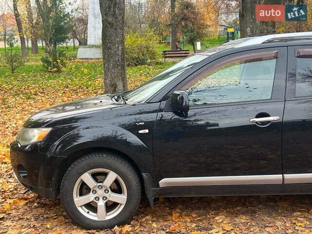 Черный Мицубиси Аутлендер ХЛ, объемом двигателя 3 л и пробегом 285 тыс. км за 9590 $, фото 6 на Automoto.ua