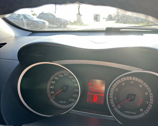 Черный Мицубиси Аутлендер ХЛ, объемом двигателя 2.4 л и пробегом 198 тыс. км за 11000 $, фото 2 на Automoto.ua