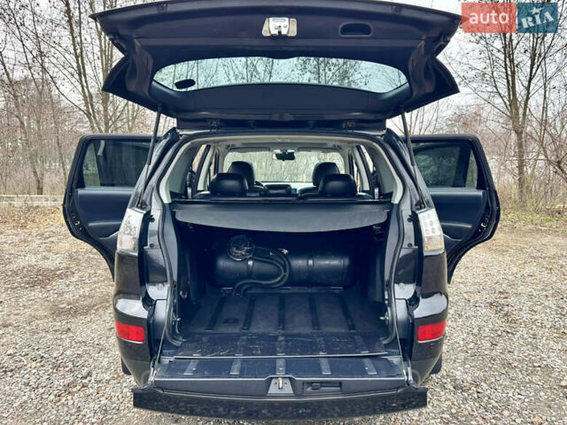 Чорний Міцубісі Аутлендер ХЛ, об'ємом двигуна 2.4 л та пробігом 229 тис. км за 9790 $, фото 23 на Automoto.ua