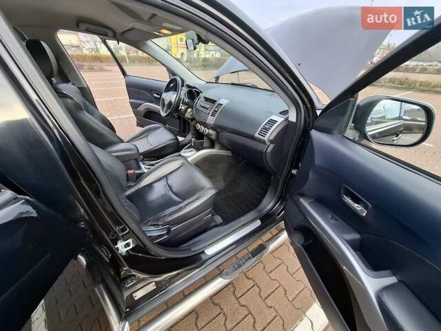 Черный Мицубиси Аутлендер ХЛ, объемом двигателя 2.36 л и пробегом 211 тыс. км за 10500 $, фото 19 на Automoto.ua