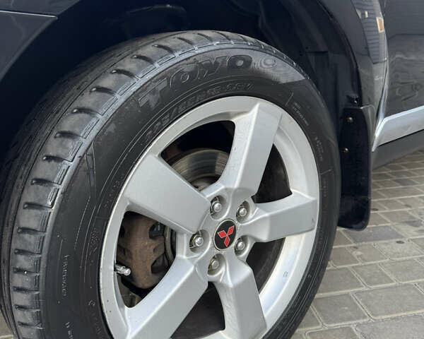 Чорний Міцубісі Аутлендер ХЛ, об'ємом двигуна 3 л та пробігом 243 тис. км за 12500 $, фото 30 на Automoto.ua