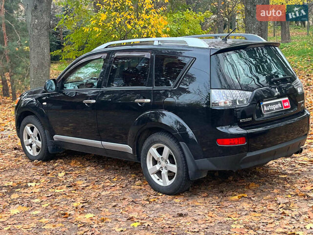 Черный Мицубиси Аутлендер ХЛ, объемом двигателя 3 л и пробегом 285 тыс. км за 9590 $, фото 7 на Automoto.ua
