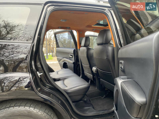 Черный Мицубиси Аутлендер ХЛ, объемом двигателя 3 л и пробегом 154 тыс. км за 8900 $, фото 28 на Automoto.ua