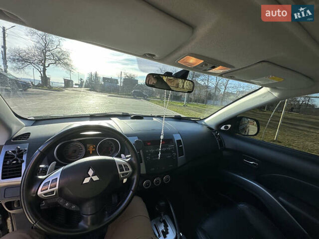 Черный Мицубиси Аутлендер ХЛ, объемом двигателя 2.4 л и пробегом 198 тыс. км за 11000 $, фото 20 на Automoto.ua