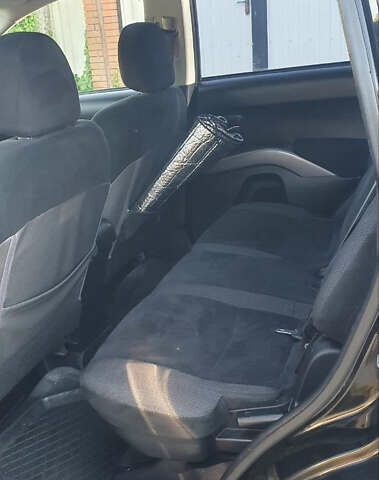 Чорний Міцубісі Аутлендер ХЛ, об'ємом двигуна 2.4 л та пробігом 325 тис. км за 7000 $, фото 6 на Automoto.ua