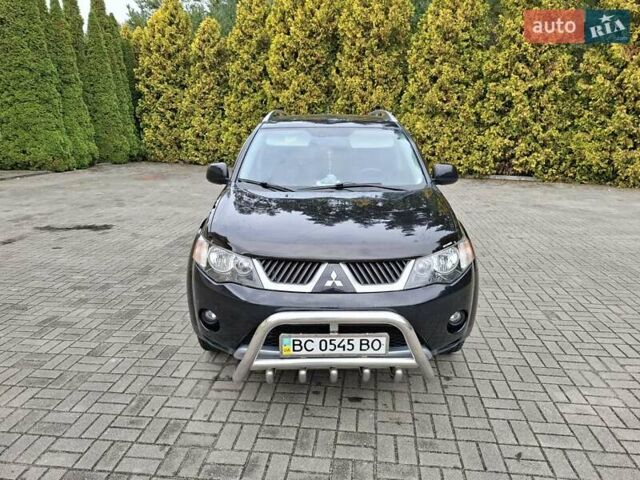Черный Мицубиси Аутлендер ХЛ, объемом двигателя 2.4 л и пробегом 127 тыс. км за 10500 $, фото 16 на Automoto.ua