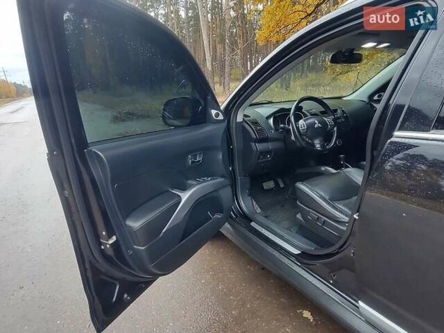 Черный Мицубиси Аутлендер ХЛ, объемом двигателя 3 л и пробегом 240 тыс. км за 9400 $, фото 11 на Automoto.ua
