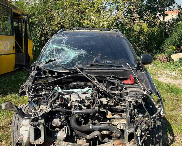 Черный Мицубиси Аутлендер ХЛ, объемом двигателя 2 л и пробегом 200 тыс. км за 2450 $, фото 9 на Automoto.ua