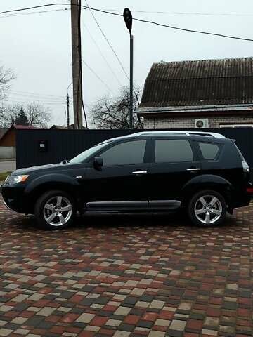 Чорний Міцубісі Аутлендер ХЛ, об'ємом двигуна 2.36 л та пробігом 150 тис. км за 11100 $, фото 5 на Automoto.ua