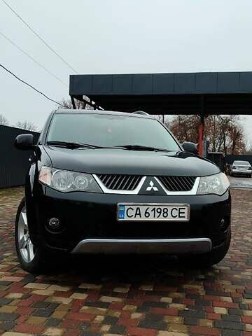 Чорний Міцубісі Аутлендер ХЛ, об'ємом двигуна 2.36 л та пробігом 150 тис. км за 11100 $, фото 2 на Automoto.ua