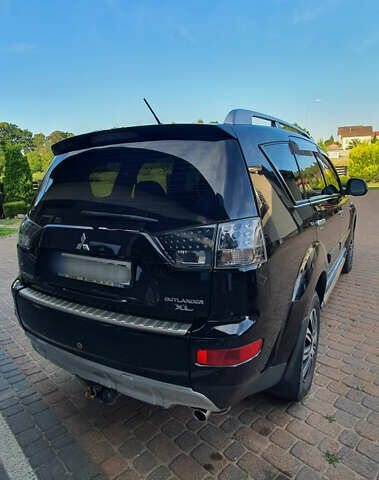 Черный Мицубиси Аутлендер ХЛ, объемом двигателя 2.4 л и пробегом 146 тыс. км за 10500 $, фото 7 на Automoto.ua