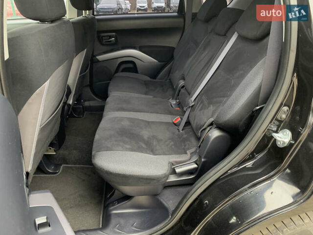 Черный Мицубиси Аутлендер ХЛ, объемом двигателя 2.4 л и пробегом 175 тыс. км за 10499 $, фото 26 на Automoto.ua