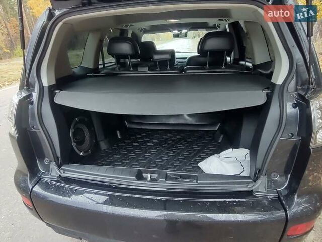 Черный Мицубиси Аутлендер ХЛ, объемом двигателя 3 л и пробегом 240 тыс. км за 9400 $, фото 14 на Automoto.ua