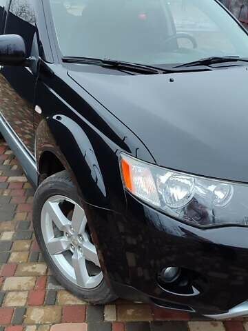 Чорний Міцубісі Аутлендер ХЛ, об'ємом двигуна 2.36 л та пробігом 150 тис. км за 11100 $, фото 11 на Automoto.ua