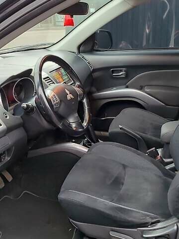 Чорний Міцубісі Аутлендер ХЛ, об'ємом двигуна 2.36 л та пробігом 150 тис. км за 11100 $, фото 14 на Automoto.ua