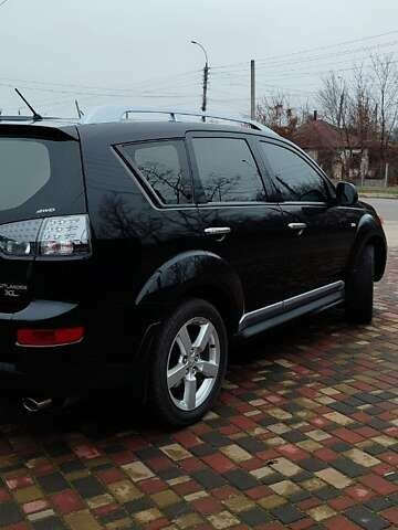 Чорний Міцубісі Аутлендер ХЛ, об'ємом двигуна 2.36 л та пробігом 150 тис. км за 11100 $, фото 8 на Automoto.ua