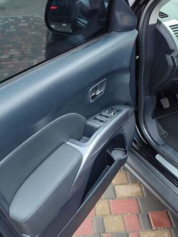 Чорний Міцубісі Аутлендер ХЛ, об'ємом двигуна 2.36 л та пробігом 150 тис. км за 11100 $, фото 13 на Automoto.ua