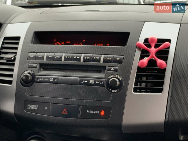 Черный Мицубиси Аутлендер ХЛ, объемом двигателя 2.4 л и пробегом 175 тыс. км за 10499 $, фото 38 на Automoto.ua