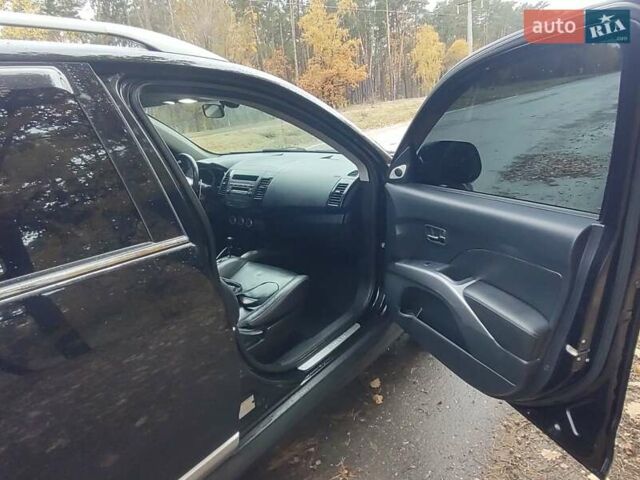 Черный Мицубиси Аутлендер ХЛ, объемом двигателя 3 л и пробегом 240 тыс. км за 9400 $, фото 8 на Automoto.ua