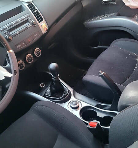 Черный Мицубиси Аутлендер ХЛ, объемом двигателя 2 л и пробегом 200 тыс. км за 2450 $, фото 8 на Automoto.ua