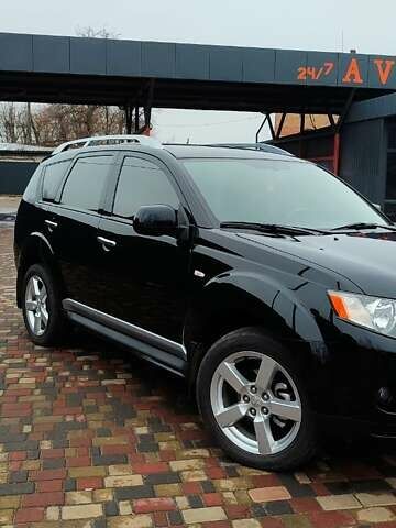 Чорний Міцубісі Аутлендер ХЛ, об'ємом двигуна 2.36 л та пробігом 150 тис. км за 11100 $, фото 1 на Automoto.ua