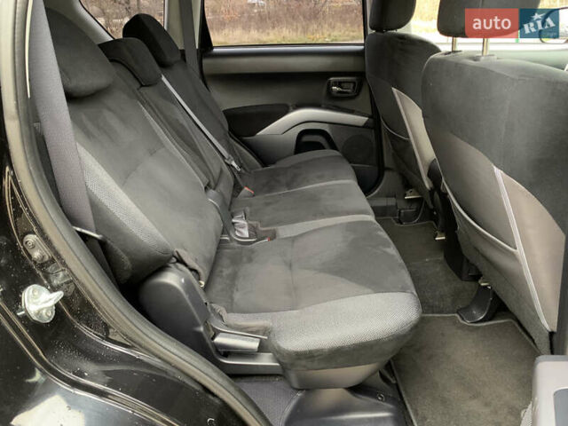 Черный Мицубиси Аутлендер ХЛ, объемом двигателя 2.4 л и пробегом 175 тыс. км за 10499 $, фото 30 на Automoto.ua