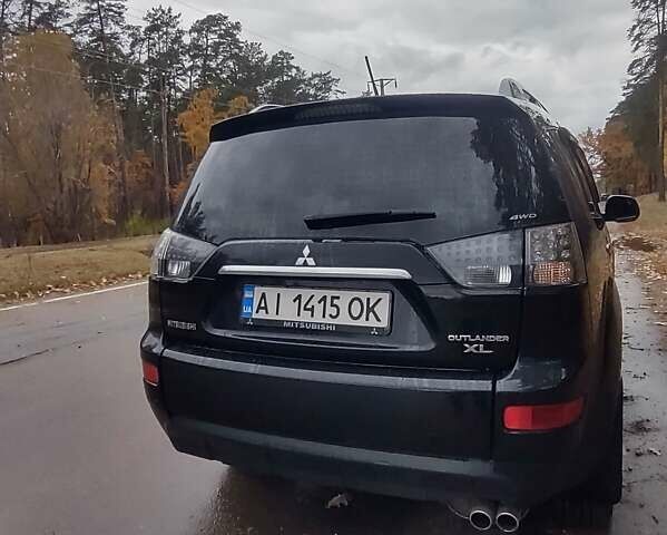 Черный Мицубиси Аутлендер ХЛ, объемом двигателя 3 л и пробегом 240 тыс. км за 9400 $, фото 7 на Automoto.ua