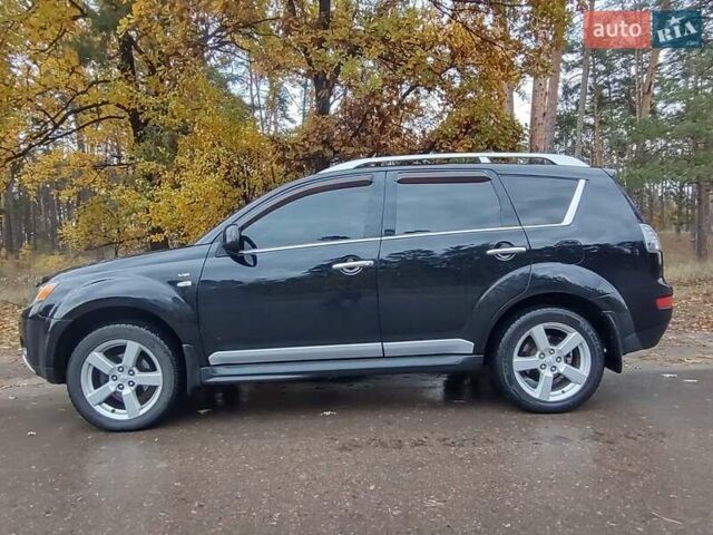 Черный Мицубиси Аутлендер ХЛ, объемом двигателя 3 л и пробегом 240 тыс. км за 9400 $, фото 5 на Automoto.ua