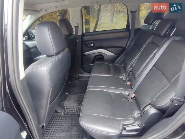 Черный Мицубиси Аутлендер ХЛ, объемом двигателя 3 л и пробегом 240 тыс. км за 9400 $, фото 13 на Automoto.ua