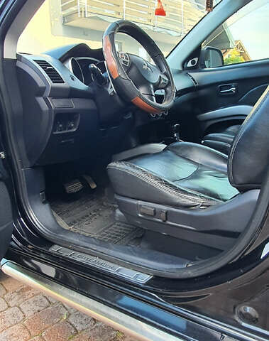 Черный Мицубиси Аутлендер ХЛ, объемом двигателя 2.4 л и пробегом 146 тыс. км за 10500 $, фото 14 на Automoto.ua