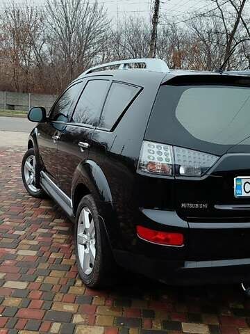 Чорний Міцубісі Аутлендер ХЛ, об'ємом двигуна 2.36 л та пробігом 150 тис. км за 11100 $, фото 6 на Automoto.ua