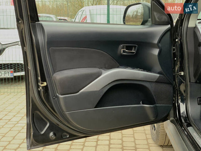 Черный Мицубиси Аутлендер ХЛ, объемом двигателя 2.4 л и пробегом 175 тыс. км за 10499 $, фото 22 на Automoto.ua