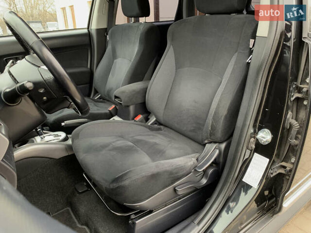 Черный Мицубиси Аутлендер ХЛ, объемом двигателя 2.4 л и пробегом 175 тыс. км за 10499 $, фото 24 на Automoto.ua