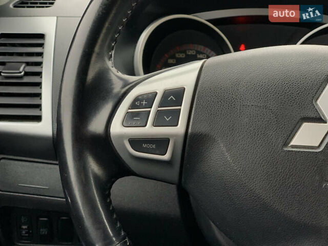 Черный Мицубиси Аутлендер ХЛ, объемом двигателя 2.4 л и пробегом 175 тыс. км за 10499 $, фото 42 на Automoto.ua