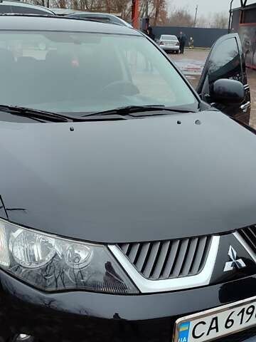 Чорний Міцубісі Аутлендер ХЛ, об'ємом двигуна 2.36 л та пробігом 150 тис. км за 11100 $, фото 12 на Automoto.ua