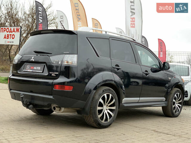 Черный Мицубиси Аутлендер ХЛ, объемом двигателя 2.4 л и пробегом 175 тыс. км за 10499 $, фото 12 на Automoto.ua