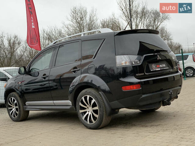 Черный Мицубиси Аутлендер ХЛ, объемом двигателя 2.4 л и пробегом 175 тыс. км за 10499 $, фото 16 на Automoto.ua