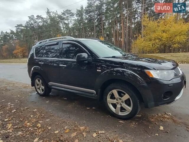 Черный Мицубиси Аутлендер ХЛ, объемом двигателя 3 л и пробегом 240 тыс. км за 9400 $, фото 2 на Automoto.ua