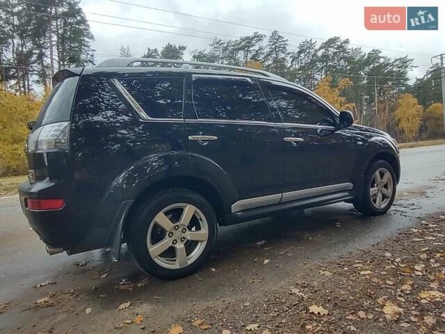Черный Мицубиси Аутлендер ХЛ, объемом двигателя 3 л и пробегом 240 тыс. км за 9400 $, фото 6 на Automoto.ua