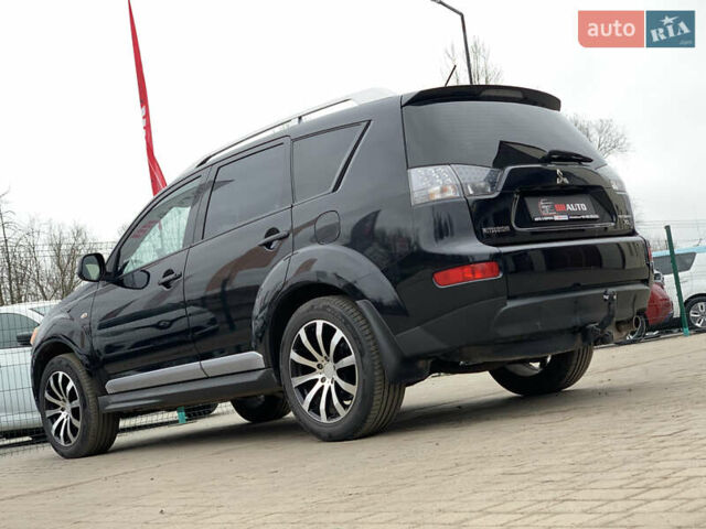 Черный Мицубиси Аутлендер ХЛ, объемом двигателя 2.4 л и пробегом 175 тыс. км за 10499 $, фото 17 на Automoto.ua