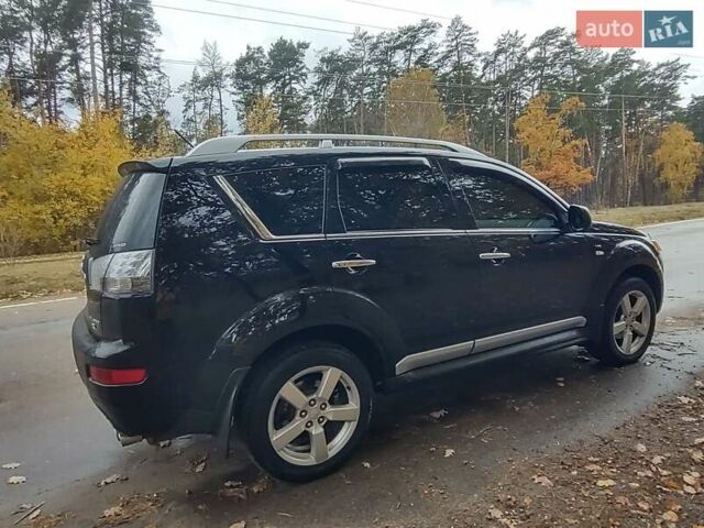Черный Мицубиси Аутлендер ХЛ, объемом двигателя 3 л и пробегом 240 тыс. км за 9400 $, фото 3 на Automoto.ua