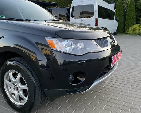 Черный Мицубиси Аутлендер ХЛ, объемом двигателя 2.2 л и пробегом 272 тыс. км за 9100 $, фото 8 на Automoto.ua