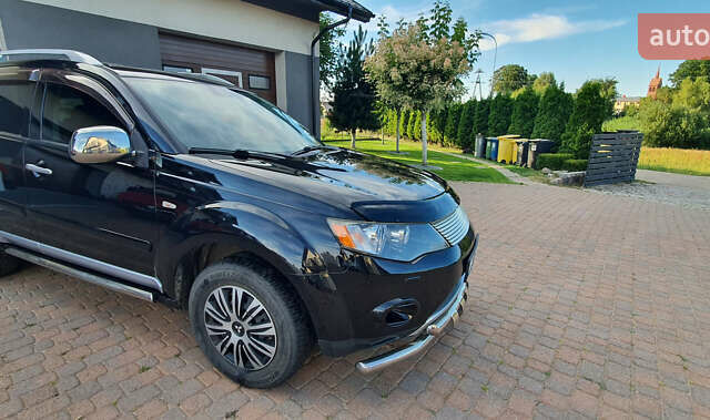 Черный Мицубиси Аутлендер ХЛ, объемом двигателя 2.4 л и пробегом 146 тыс. км за 10500 $, фото 3 на Automoto.ua