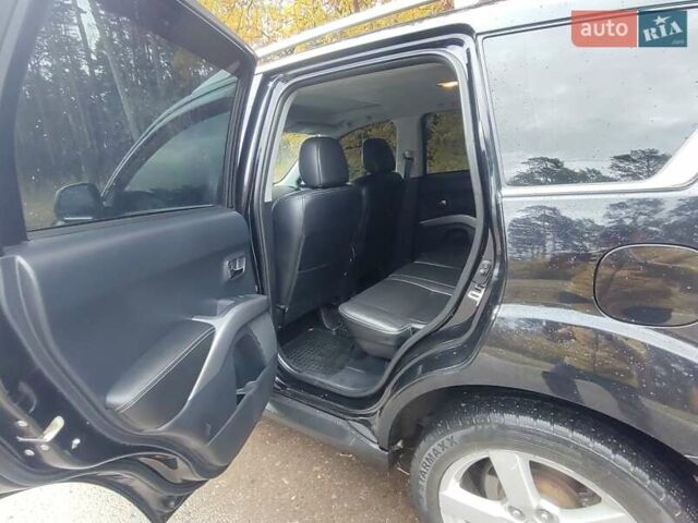 Черный Мицубиси Аутлендер ХЛ, объемом двигателя 3 л и пробегом 240 тыс. км за 9400 $, фото 10 на Automoto.ua