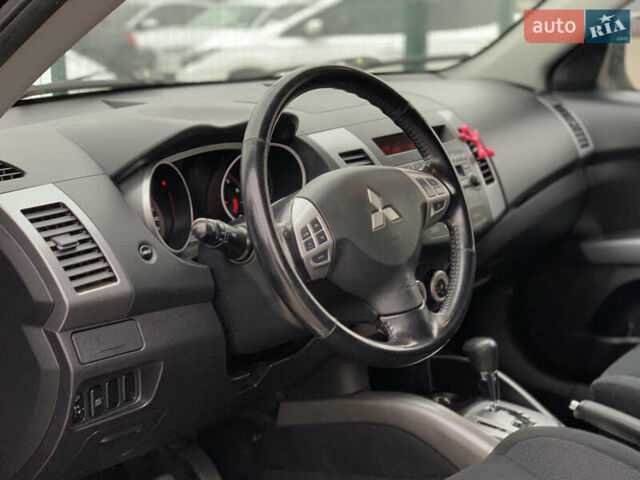 Черный Мицубиси Аутлендер ХЛ, объемом двигателя 2.4 л и пробегом 175 тыс. км за 10499 $, фото 23 на Automoto.ua